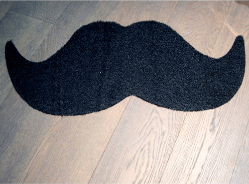 Felpudo divertido con forma de bigote